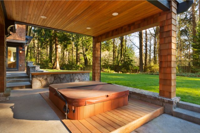 Backyard Hot Tub under a covered patio